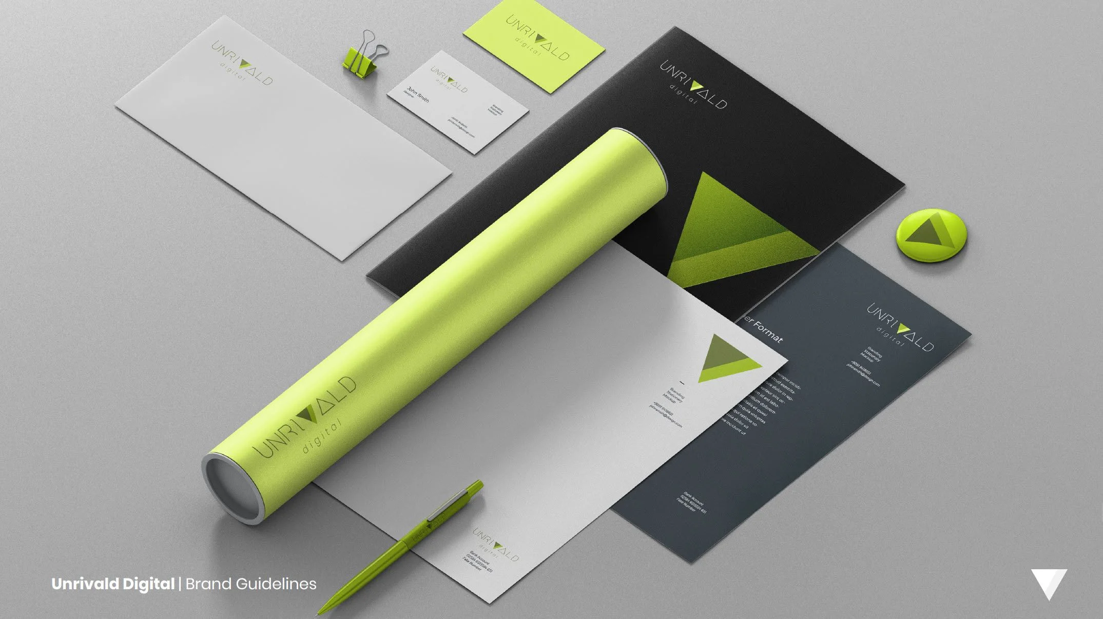 Unrivald Digital brand guidelines laid out with stationery, branded materials, and a lime-green tumbler